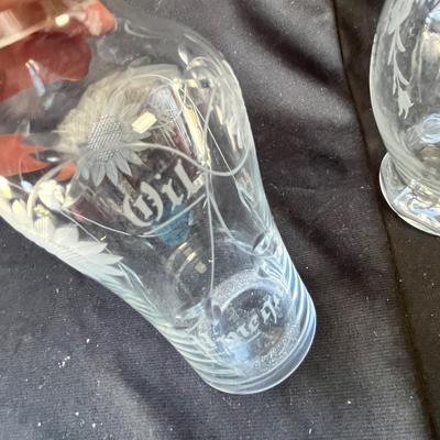 Sale Photo Thumbnail #1109: The two are salad cruets, probably Hawkes glass.  The other is silver overlay.