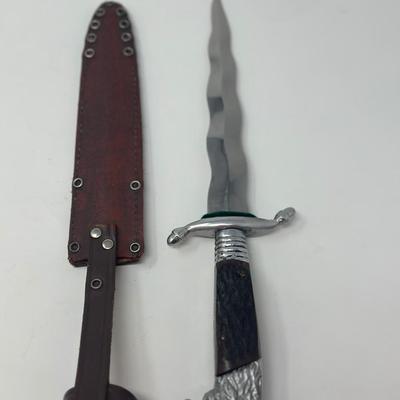 Sale Photo Thumbnail #264: 10 1/2”
Circa 1940-60's Kris Dagger made by G.C. Co. Solingen Germany. It has a full S shaped aluminum guard with a cast aluminum lion head pommel.
