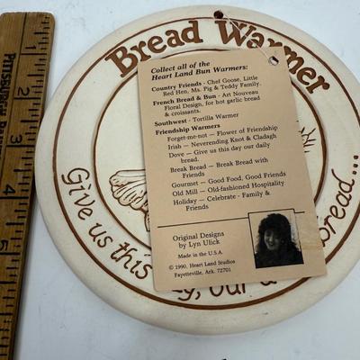 Sale Photo Thumbnail #453: From Heart Land Studios. In New Condition with tag. With the religious inscription "Give us this day, our daily bread..."