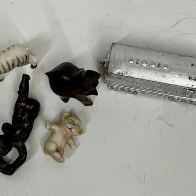 Sale Photo Thumbnail #399: Includes a zebra, elephant, chrome train engine, cat and