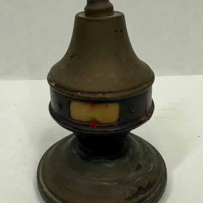 Sale Photo Thumbnail #471: Condition unknown, window to view temperature scale is yellowed and mostly opaque. Thermo Dial Laboratories was a Newark, NJ company from the early 20th century that produced figural, desktop-style thermometers that doubled as paperweights and served as i