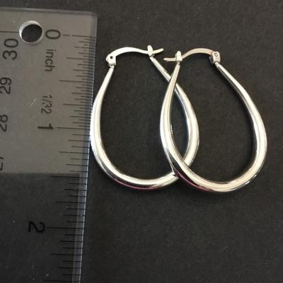 Very nice silver toned hoop, earrings,