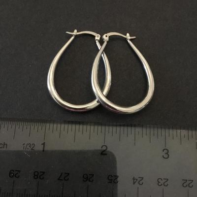 Very nice silver toned hoop, earrings,