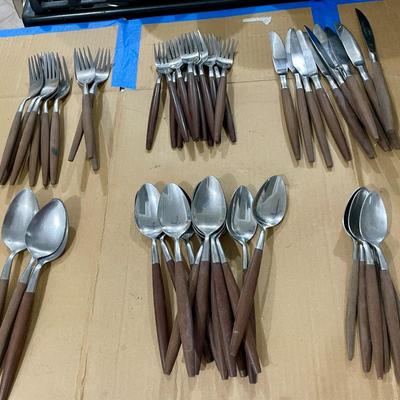 Sale Photo Thumbnail #279: Includes 9 dinner forks, 13 salad forks, 10 dinner knives, 3 serving spoons, 12 soup spoons and 6 teaspoons.