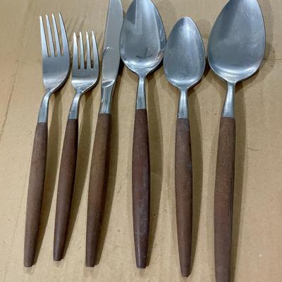 Sale Photo Thumbnail #281: Includes 9 dinner forks, 13 salad forks, 10 dinner knives, 3 serving spoons, 12 soup spoons and 6 teaspoons.