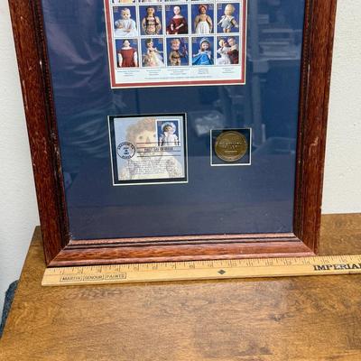 Sale Photo Thumbnail #187: A USPS Oistmaek Gallery Limited Edition. Framed items includes a 15-stamp block of 32c Classic American Dolls, a First Day Cover, and a commemorative coin.  Great addition to any stamp or doll lover’s collection.