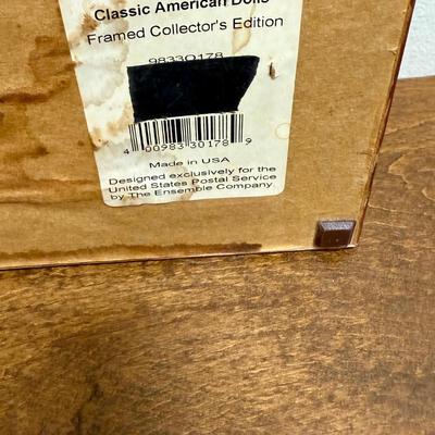 Sale Photo Thumbnail #189: A USPS Oistmaek Gallery Limited Edition. Framed items includes a 15-stamp block of 32c Classic American Dolls, a First Day Cover, and a commemorative coin.  Great addition to any stamp or doll lover’s collection.