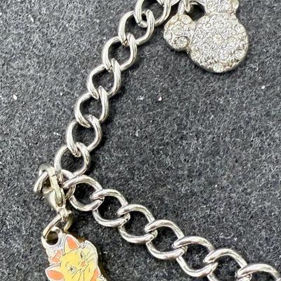 Sale Photo Thumbnail #124: YyyyyApprox. 4" lon, has 4 charms as shown in the photos.