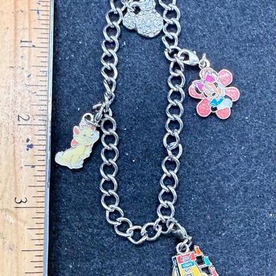 Sale Photo Thumbnail #122: YyyyyApprox. 4" lon, has 4 charms as shown in the photos.