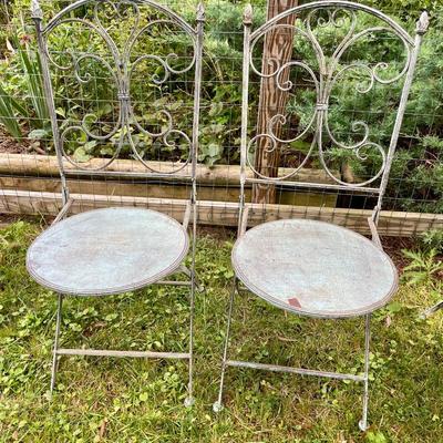 Sale Photo Thumbnail #413: Includes two folding chairs and folding table.