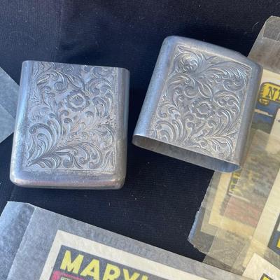 Sale Photo Thumbnail #1354: These are new, but probably don't stick well.  In original bags!  Very cool  Also is an aluminum cigarette case.