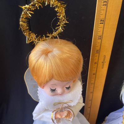 Sale Photo Thumbnail #1361: Tree topper is in good shape.  Music box works, but the head doesn't stay on.