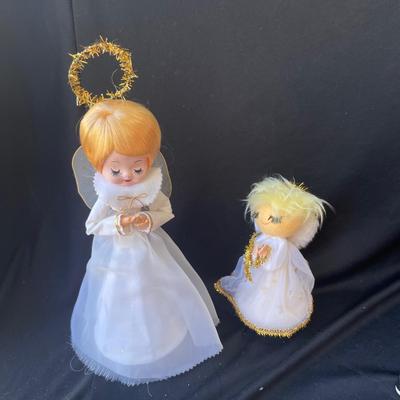 Sale Photo Thumbnail #1360: Tree topper is in good shape.  Music box works, but the head doesn't stay on.