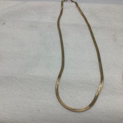 Sale Photo Thumbnail #235: You get the three pieces of jewelry.  Matching gold necklace and bracelet and a nice metal choker necklace with modern design.