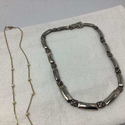 Sale Photo Thumbnail #239: Beaded necklace, green plastic and metal choker, gold with white beads necklace and modern metal choker.