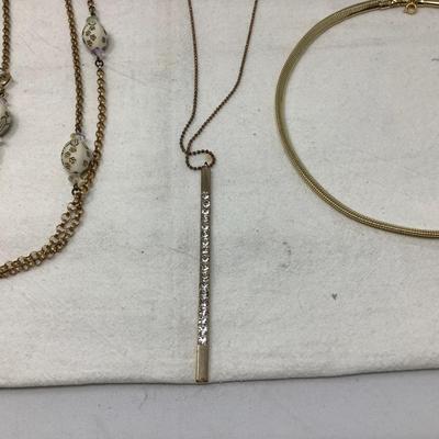 Sale Photo Thumbnail #242: You get the nice gold choker, the gold with dual gem pendants,  gold with egg necklace.
