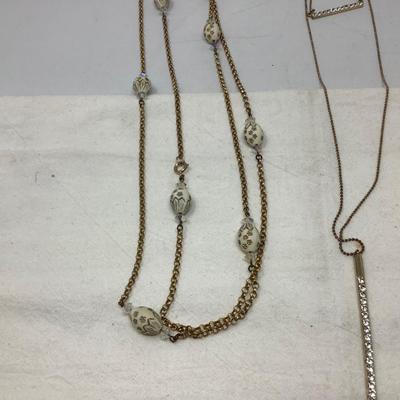 Sale Photo Thumbnail #244: You get the nice gold choker, the gold with dual gem pendants,  gold with egg necklace.