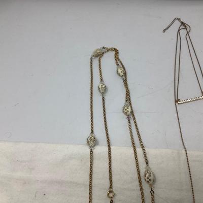 Sale Photo Thumbnail #245: You get the nice gold choker, the gold with dual gem pendants,  gold with egg necklace.