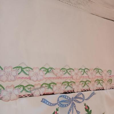 FOUR SETS (8) OF CRAFTED PILLOWCASES