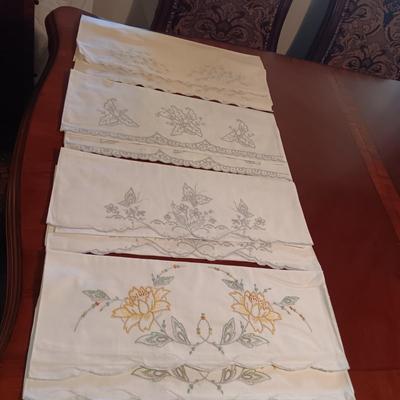 FOUR SETS OF HANDCRAFTED PILLOW CASES