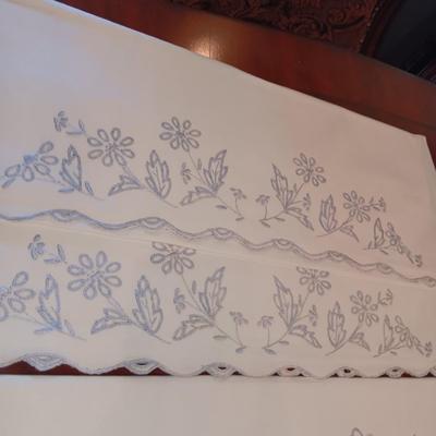 THREE SETS OF HANDCRAFTED PILLOW CASES