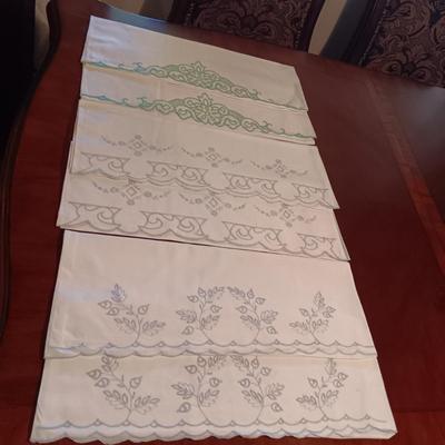 THREE SETS OF HANDCRAFTED PILLOW CASES