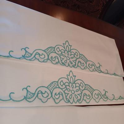 THREE SETS OF HANDCRAFTED PILLOW CASES