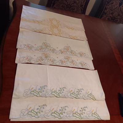 THREE SETS OF HANDCRAFTED PILLOW CASES