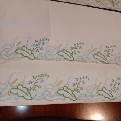 THREE SETS OF HANDCRAFTED PILLOW CASES