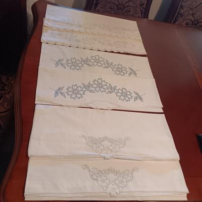 THREE SETS OF HANDCRAFTED PILLOW CASES