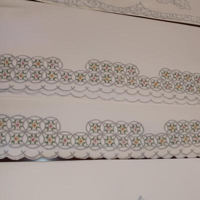 THREE SETS OF HANDCRAFTED PILLOWCASES