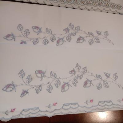 THREE SETS OF HANDCRAFTED PILLOWCASES