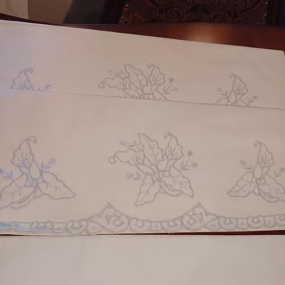 THREE SETS OF HANDCRAFTED PILLOWCASES