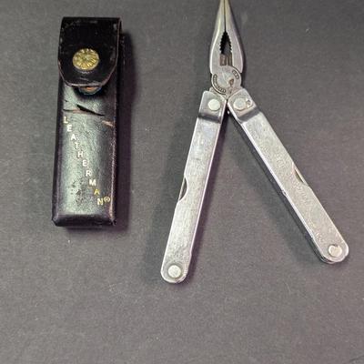 Sale Photo Thumbnail #1348: Original Leatherman TM 1325473 Tool Multi-Tool Stainless Steel With Case