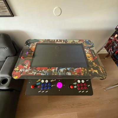 Sale Photo Thumbnail #27: The Creative Arcade Home Console offers Wi-Fi capability and displays in 720p HD resolution. It features a multicolor design and is manufactured in the United States. This pre-owned console is suitable for casual gaming sessions at home.