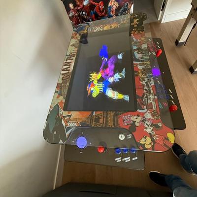 Sale Photo Thumbnail #28: The Creative Arcade Home Console offers Wi-Fi capability and displays in 720p HD resolution. It features a multicolor design and is manufactured in the United States. This pre-owned console is suitable for casual gaming sessions at home.
