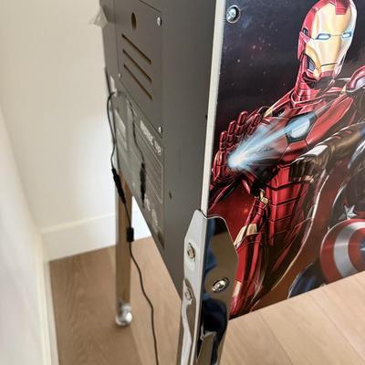 Sale Photo Thumbnail #31: The Arcade1Up Marvel Digital Pinball Machine is a home console featuring Wi-Fi capability and a 1080p full HD resolution. It stands 5 feet tall and is 2 feet in length, making it a suitable addition to any game room. This pre-owned machine is ideal for Ma
