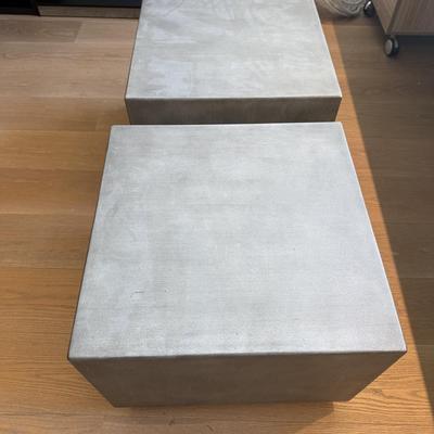 Sale Photo Thumbnail #33: This Pottery Barn coffee table from the Modern Concrete Collection is designed for both indoor and outdoor use. Crafted in the USA, it features a modern square shape with dimensions of 18 inches in height, 24 inches in length, and 24 inches in width. Made