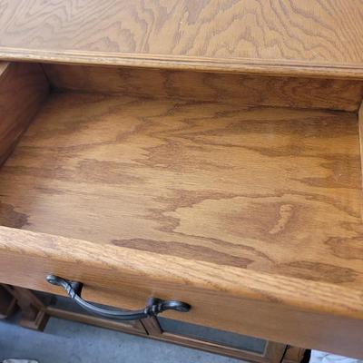 Sale Photo Thumbnail #857: Measures 48" wide, 19" deep and 57" tall. 4 shelves and two drawers, wrapped for storage and only slightly unwrapped for photos, will wrap further for transport. Oak
Doors are 21.5" wide and about 47" tall.