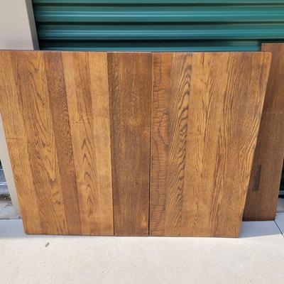 Sale Photo Thumbnail #876: Measures 50" long amd 42" wide  without leaves, each of the two leaves are 8" wide, table is aboit 30" tall when assembled, will be wrapped for buyers transport, it's heavy and solid oak