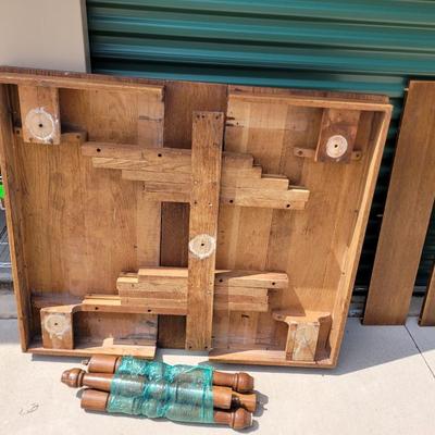 Sale Photo Thumbnail #886: Measures 50" long amd 42" wide  without leaves, each of the two leaves are 8" wide, table is aboit 30" tall when assembled, will be wrapped for buyers transport, it's heavy and solid oak