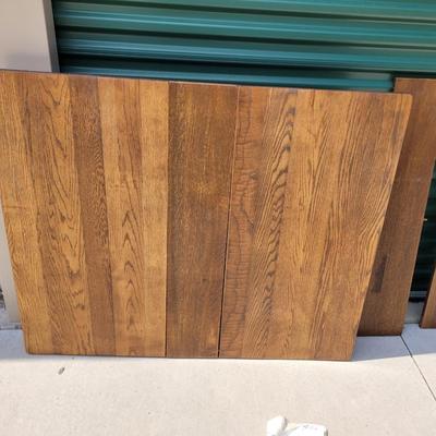 Sale Photo Thumbnail #877: Measures 50" long amd 42" wide  without leaves, each of the two leaves are 8" wide, table is aboit 30" tall when assembled, will be wrapped for buyers transport, it's heavy and solid oak