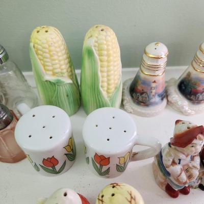 Nice Collection of Salt & Pepper Shakers Vasaline Uranium , Fish , Seahorses, Corn, Lighthouse, Pigs, Dutch boy Dutch girl