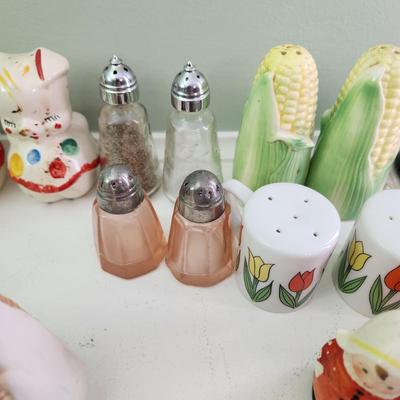 Nice Collection of Salt & Pepper Shakers Vasaline Uranium , Fish , Seahorses, Corn, Lighthouse, Pigs, Dutch boy Dutch girl