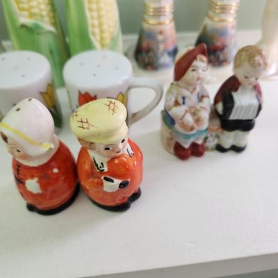 Nice Collection of Salt & Pepper Shakers Vasaline Uranium , Fish , Seahorses, Corn, Lighthouse, Pigs, Dutch boy Dutch girl