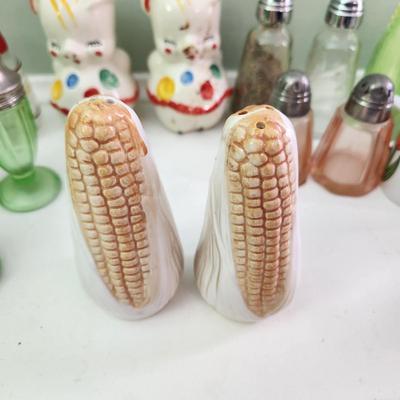 Nice Collection of Salt & Pepper Shakers Vasaline Uranium , Fish , Seahorses, Corn, Lighthouse, Pigs, Dutch boy Dutch girl
