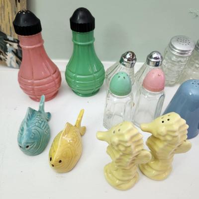 Nice Collection of Salt & Pepper Shakers Vasaline Uranium , Fish , Seahorses, Corn, Lighthouse, Pigs, Dutch boy Dutch girl