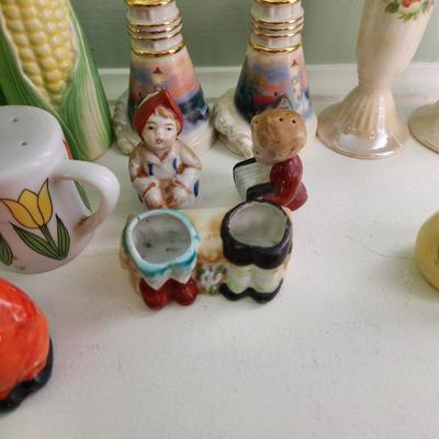 Nice Collection of Salt & Pepper Shakers Vasaline Uranium , Fish , Seahorses, Corn, Lighthouse, Pigs, Dutch boy Dutch girl