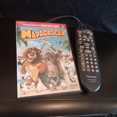 PANASONIC DVD PLAYER WITH REMOTE AND A MOVIE