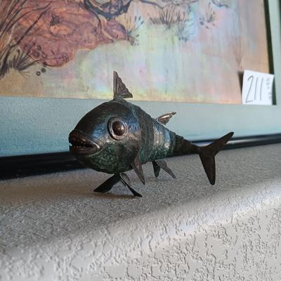 2 METAL FISH THAT ARE HINGED TO GIVE THE APPEARANCE OF MOVING